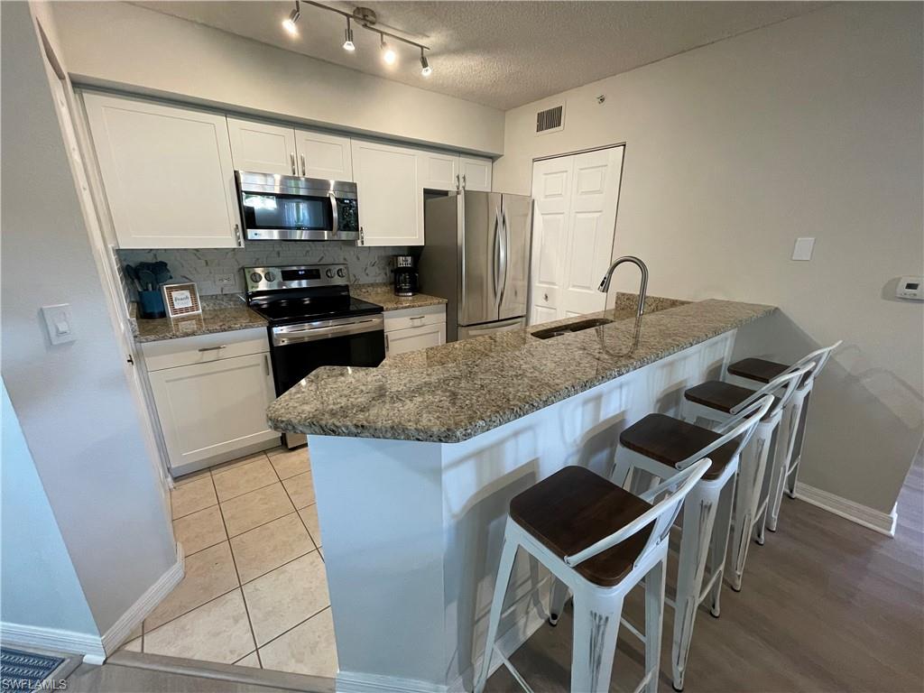 8870 Colonnades Ct W # 312 Property Photo 1