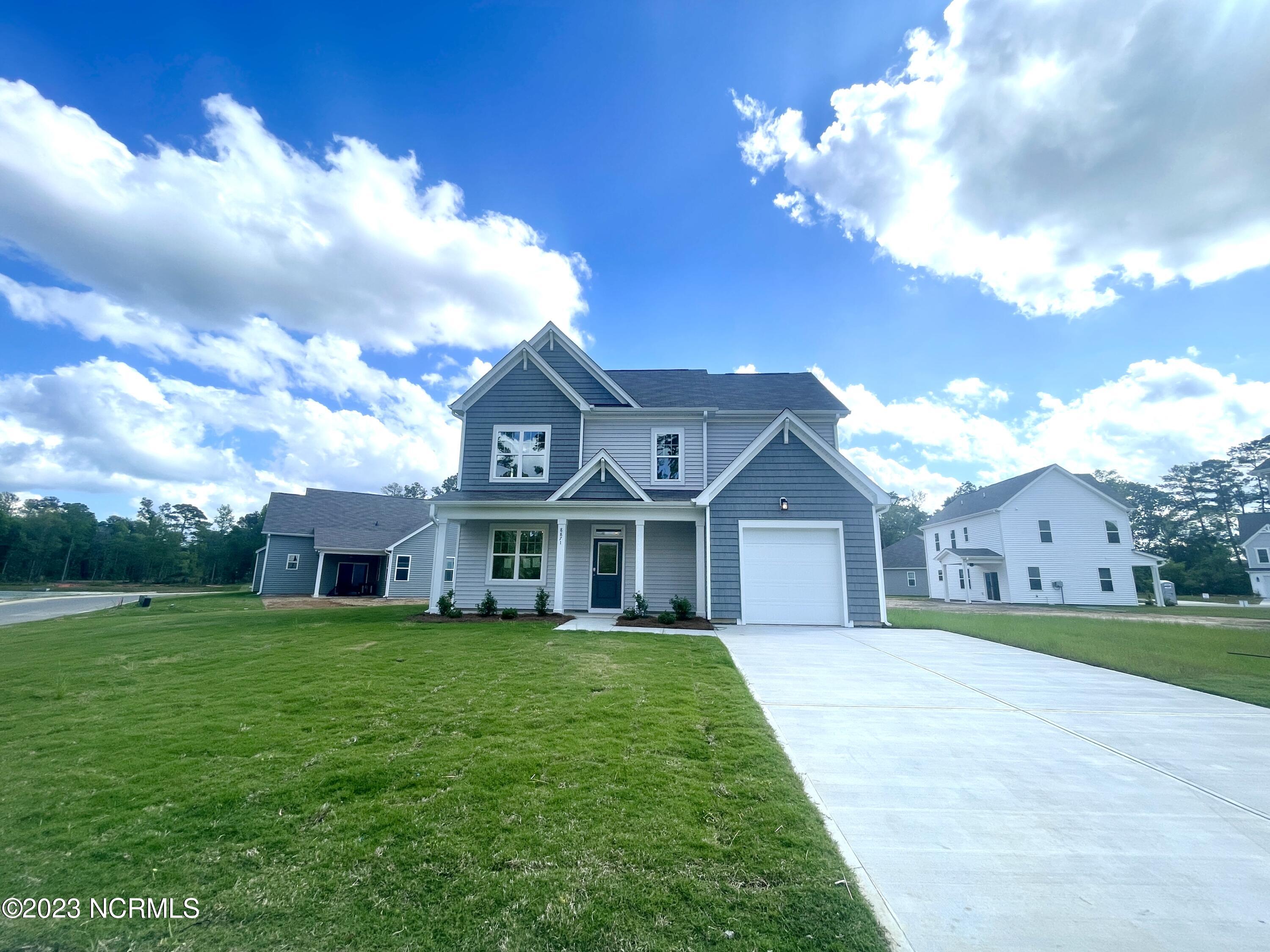 8871 NE Colbert Place Drive Property Photo 1