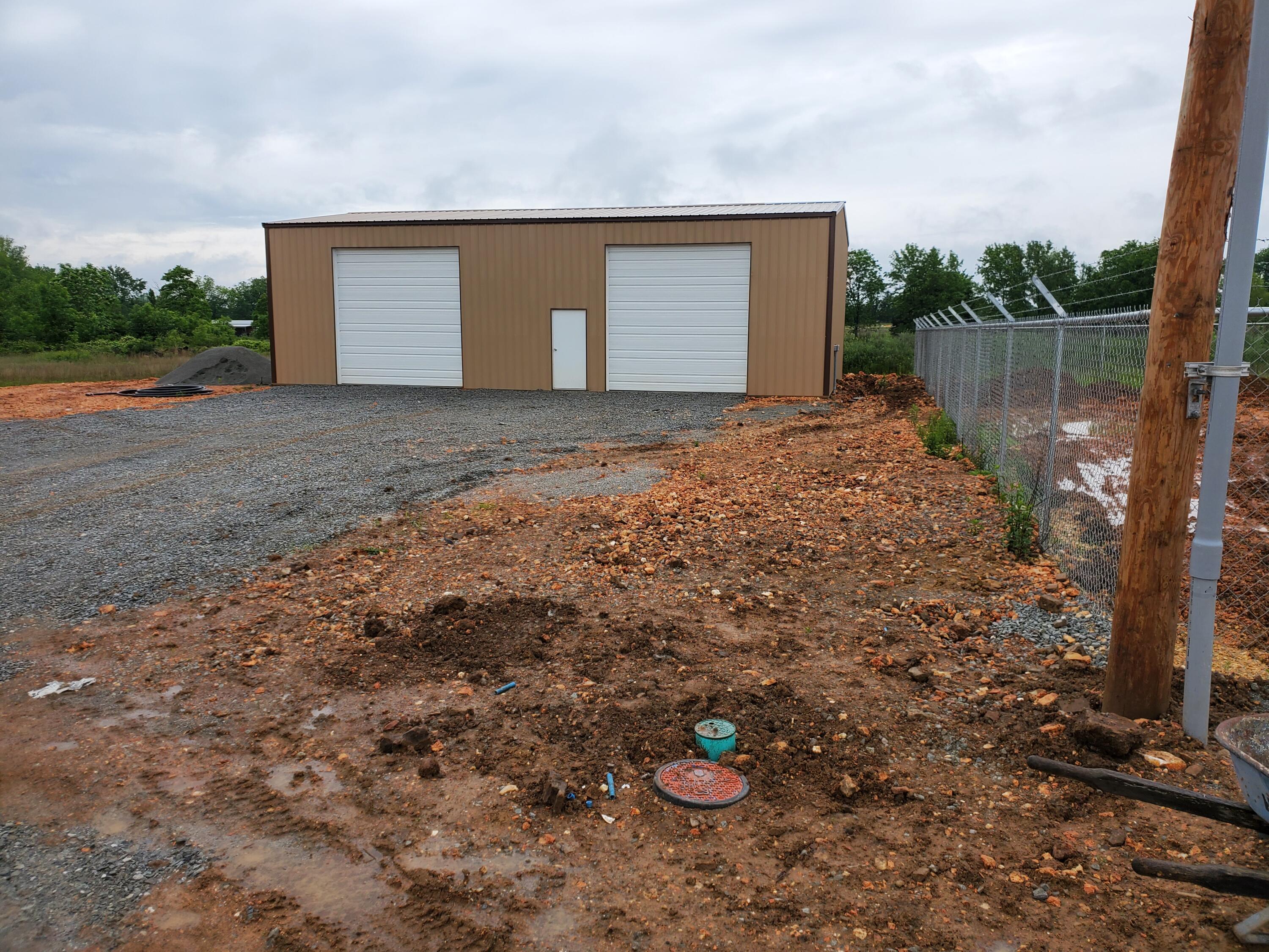 63814 E 282 Road Tan Bldg Property Photo 1